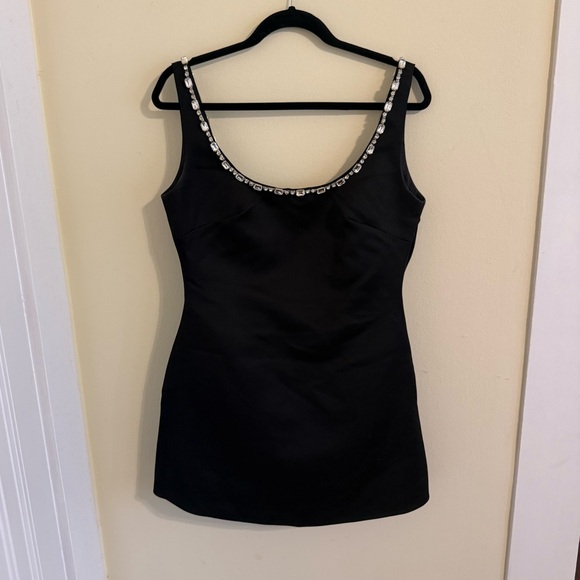 Lulu’s Cloe Black Rhinestone Backless
Bow Mini Dress
The Frolic - Picture 3 of 4